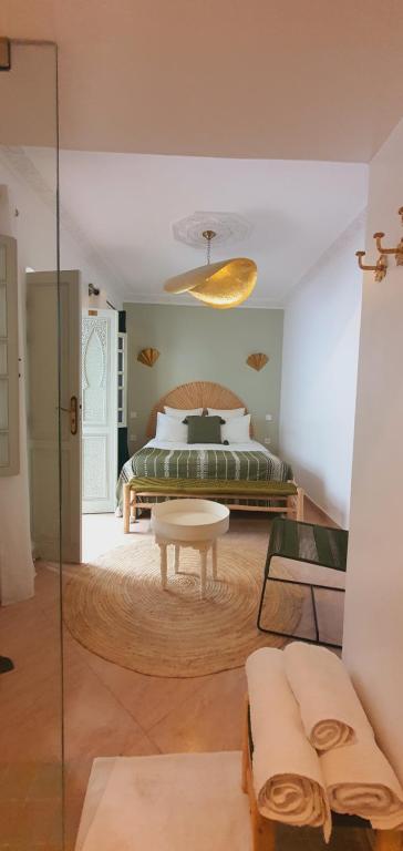 Postel nebo postele na pokoji v ubytování M-17 Riad & Spa