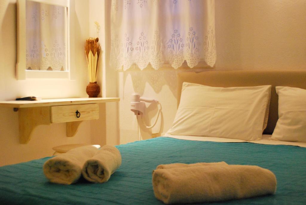 Letto o letti in una camera di Aretousa Villas