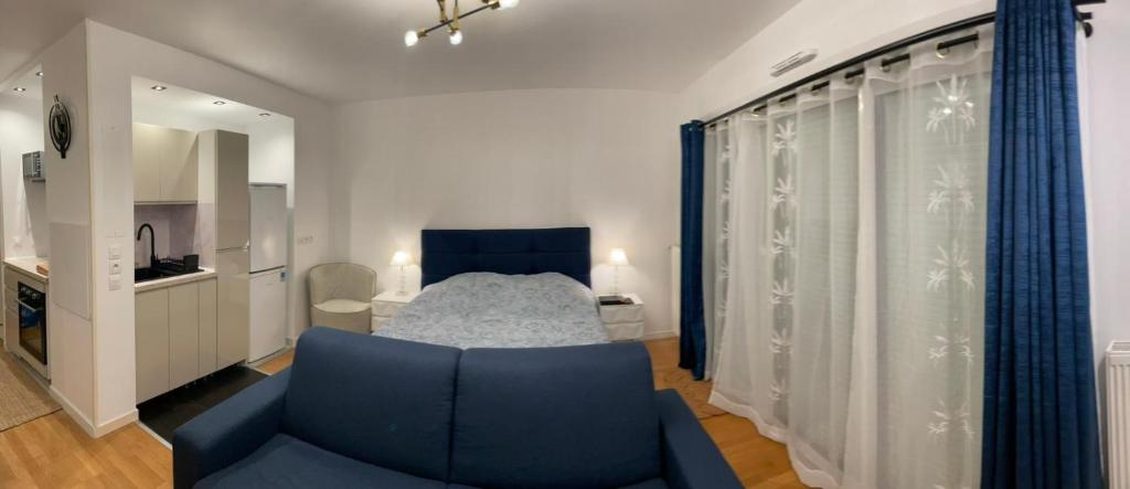 Ένα ή περισσότερα κρεβάτια σε δωμάτιο στο Chevilly Cosy