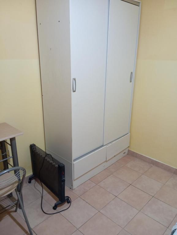TV a/nebo společenská místnost v ubytování Hostel Céntro Belén