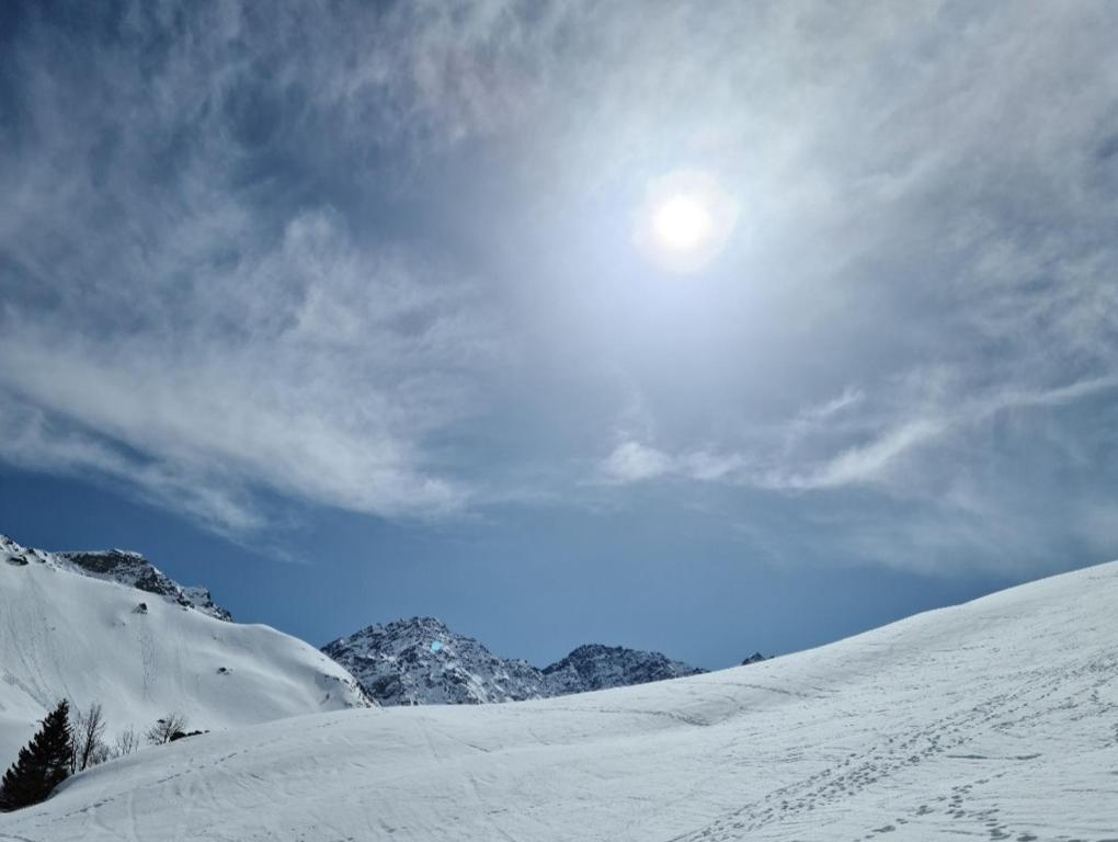 FeWo D'Rock Arosa- center of nightlife by Nature Apartments Switzerland v zimě
