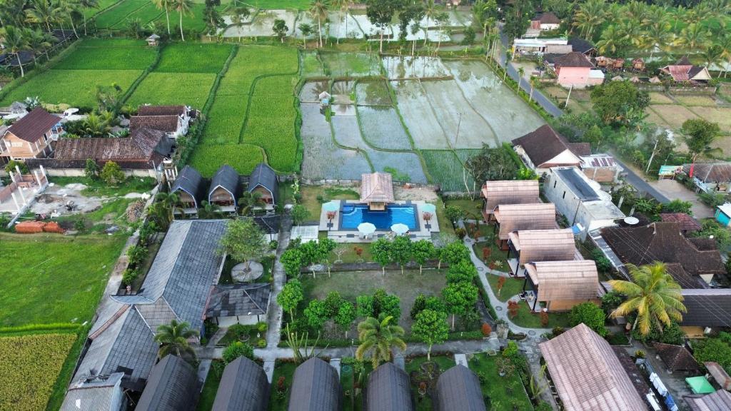 an aerial view of a house with a yard at Green Orry Inn in Tetebatu