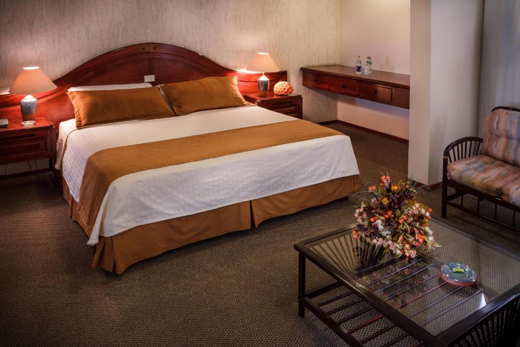 Postel nebo postele na pokoji v ubytování Hotel Ajavi