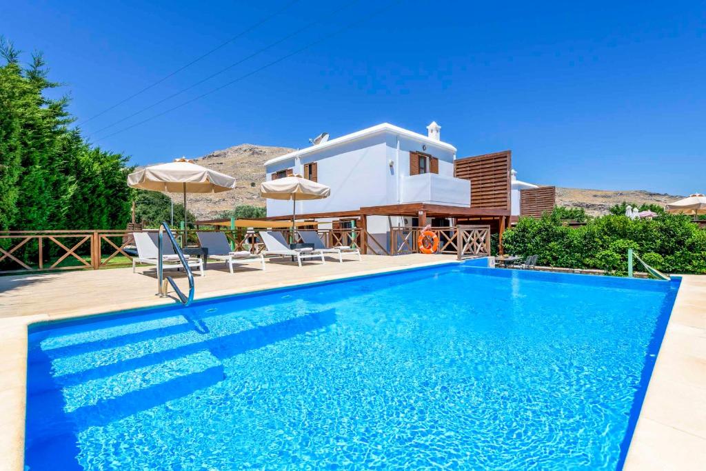 The swimming pool at or close to Lindos Emerald
