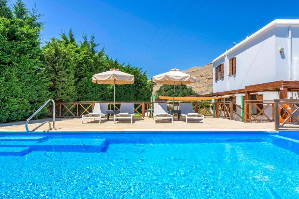 The swimming pool at or close to Lindos Emerald