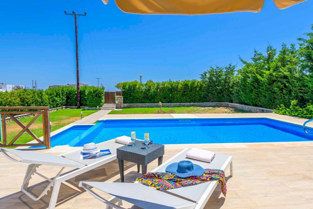 The swimming pool at or close to Lindos Emerald