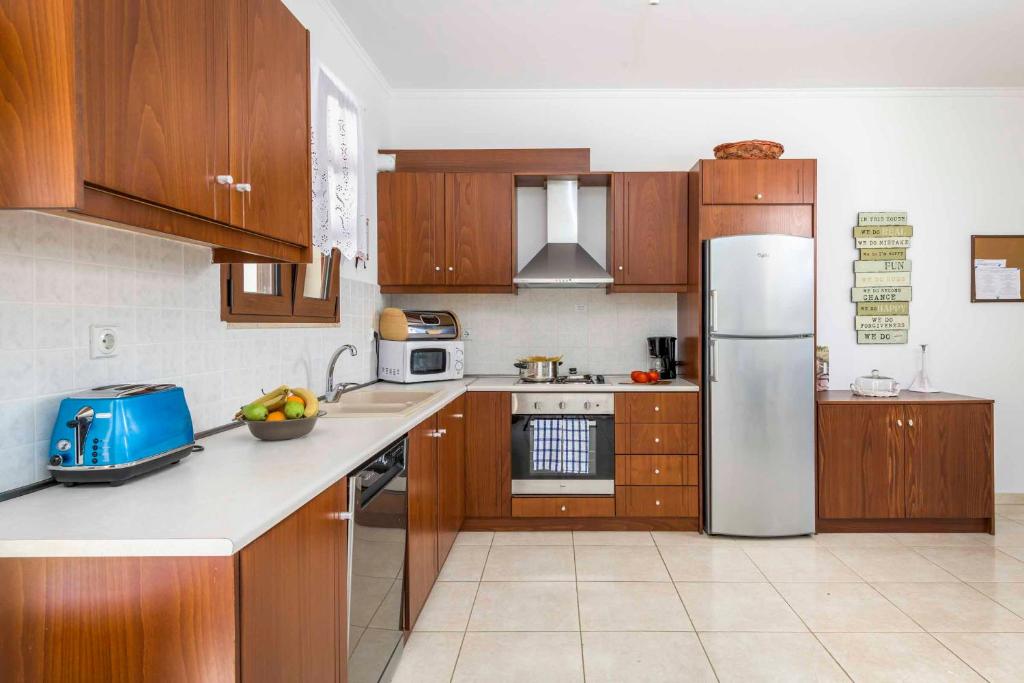 A kitchen or kitchenette at Lindos Emerald