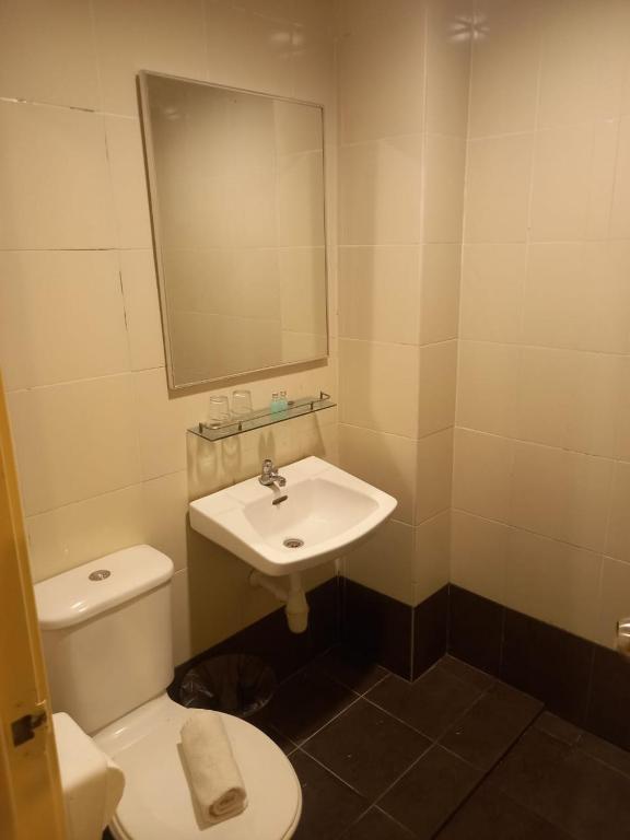 Koupelna v ubytování Syajie Koptown Hotel