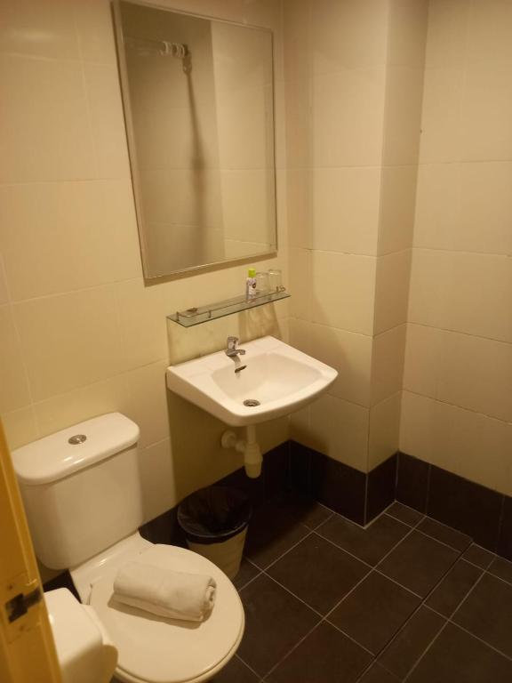 Koupelna v ubytování Syajie Koptown Hotel