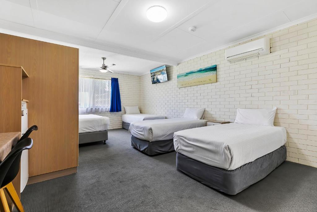 Postel nebo postele na pokoji v ubytování Comfort Inn on Main Hervey Bay