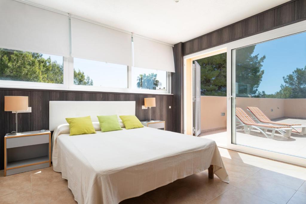 Кровать или кровати в номере Can Vauma - Alcúdia