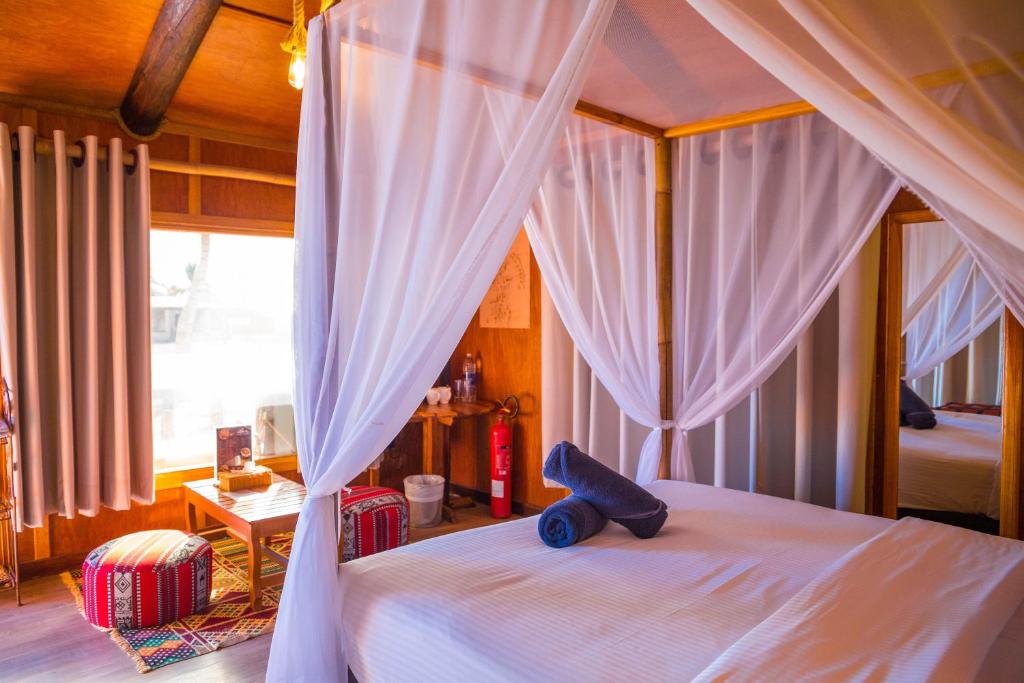 Postel nebo postele na pokoji v ubytování Souly Ecolodge Salalah