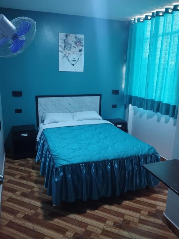 Postel nebo postele na pokoji v ubytování Hostal El Pilar