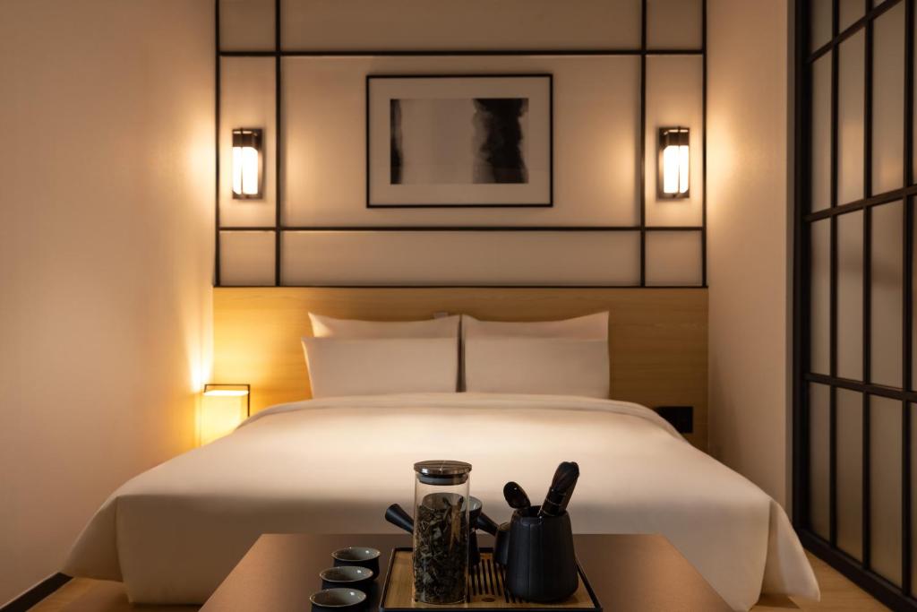 Postel nebo postele na pokoji v ubytování Mitasuya Ryokan Hotel Incheon by Aank