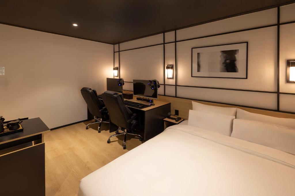 Postel nebo postele na pokoji v ubytování Mitasuya Ryokan Hotel Incheon by Aank