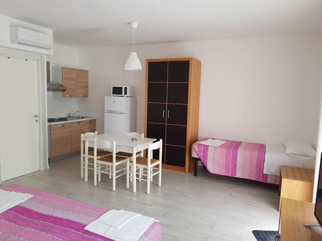 Kuchyň nebo kuchyňský kout v ubytování Duna camere con bagno