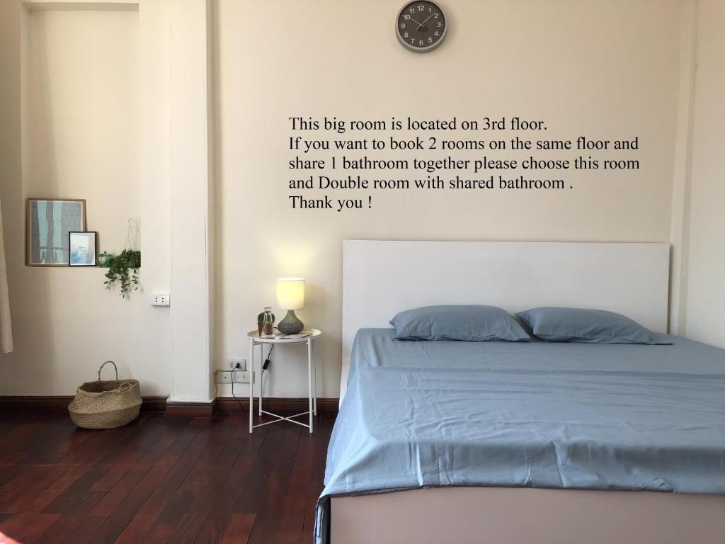 Postel nebo postele na pokoji v ubytování Khai Homestay