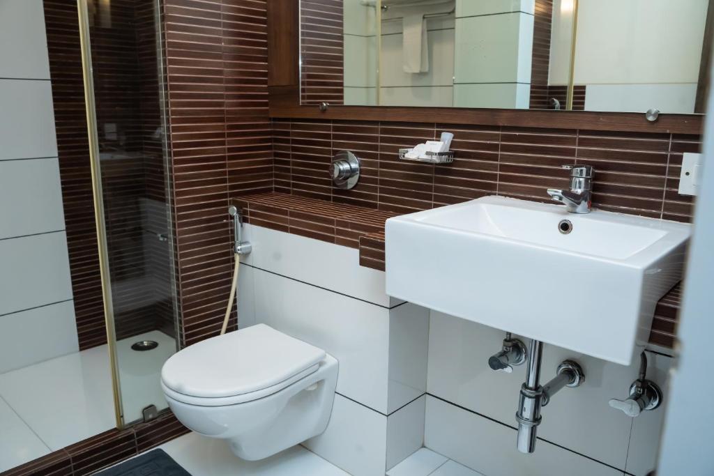 Koupelna v ubytování Shantai Hotel