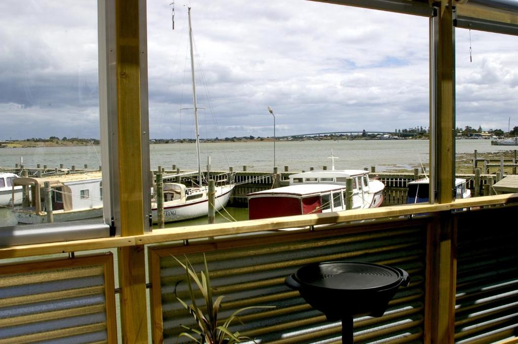 a view of a marina with boats in the water at Boat Haven Studios in Goolwa