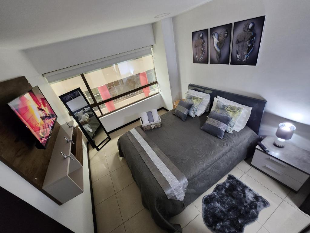 Voodi või voodid majutusasutuse Torres del sol 2 toas