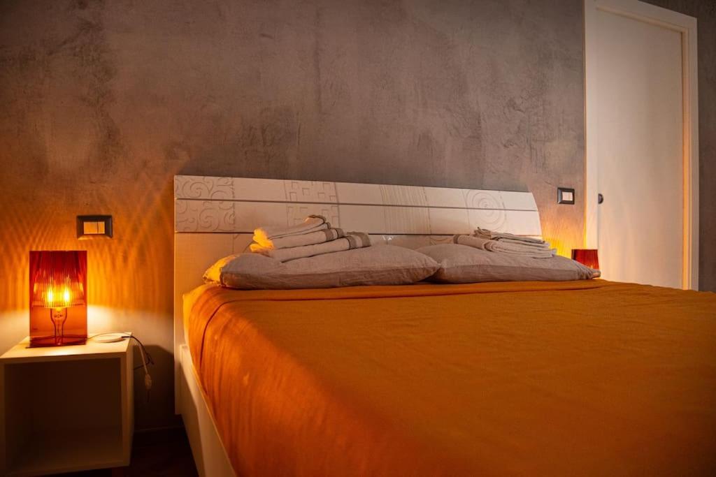 Postel nebo postele na pokoji v ubytování Domotic Suite at Villa Anna