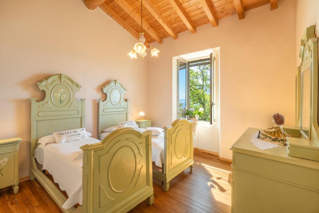 Postel nebo postele na pokoji v ubytování Piccola Meraviglia Sul Garda
