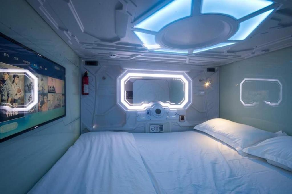 Postel nebo postele na pokoji v ubytování MY SPACE SEMPORNA