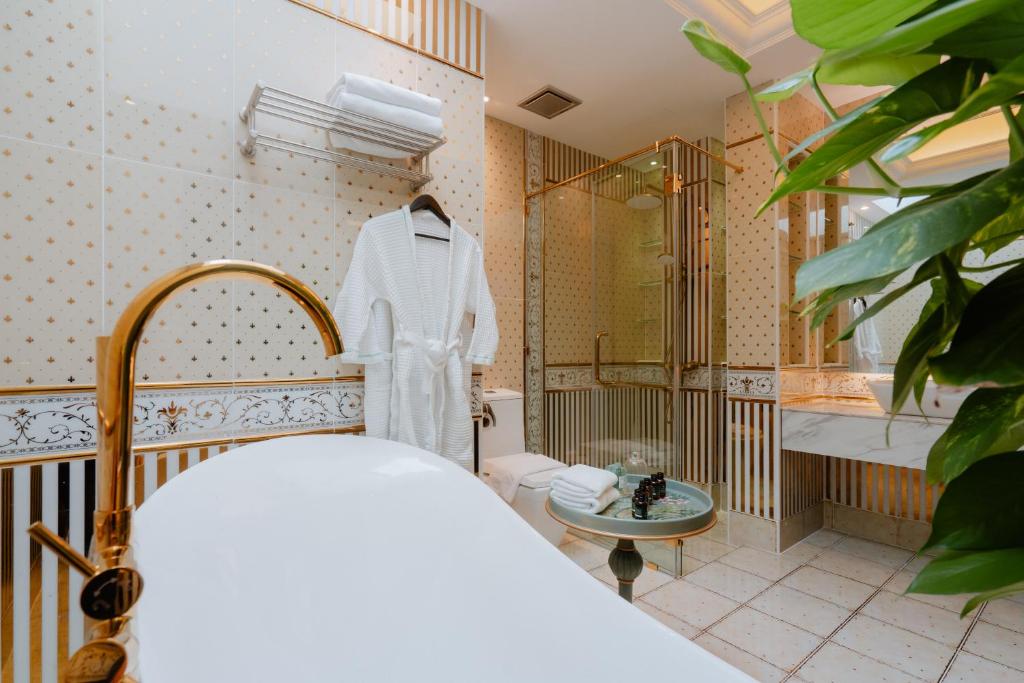 Postel nebo postele na pokoji v ubytování Midori Concept Hotel