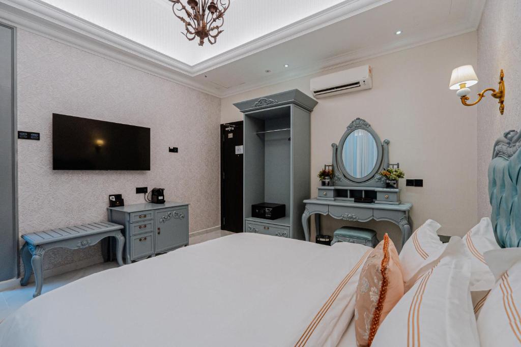 TV a/nebo společenská místnost v ubytování Midori Concept Hotel