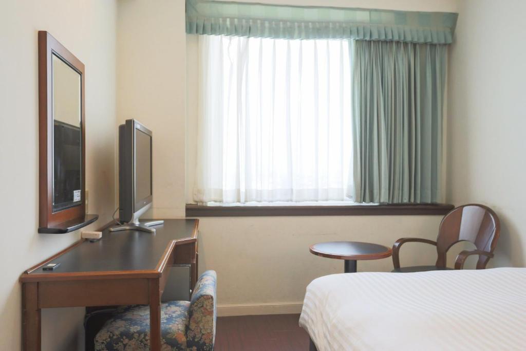 TV a/nebo společenská místnost v ubytování Hotel Castle Inn Tsu