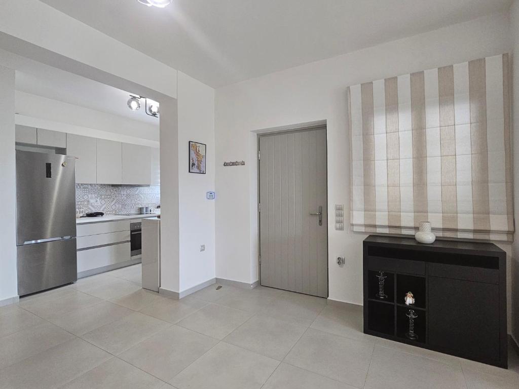 Kuchyň nebo kuchyňský kout v ubytování Villa Athina