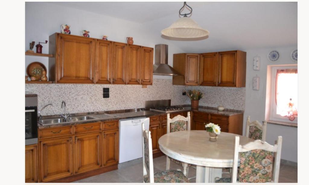 Kuchyň nebo kuchyňský kout v ubytování Agriturismo Brusalino