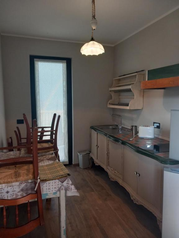 Kuchyň nebo kuchyňský kout v ubytování Agriturismo Brusalino