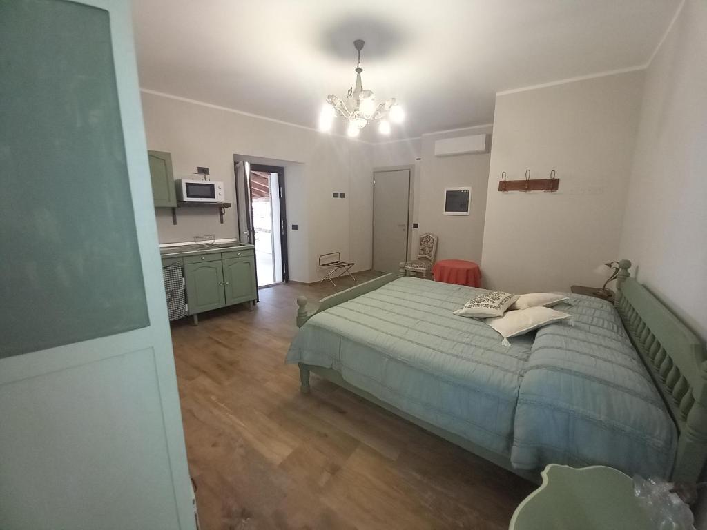 Postel nebo postele na pokoji v ubytování Agriturismo Brusalino