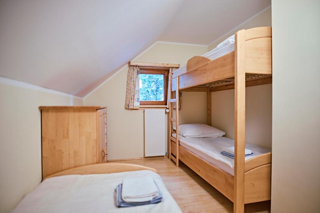 Postel nebo postele na pokoji v ubytování Apartma Smučišče Krvavec