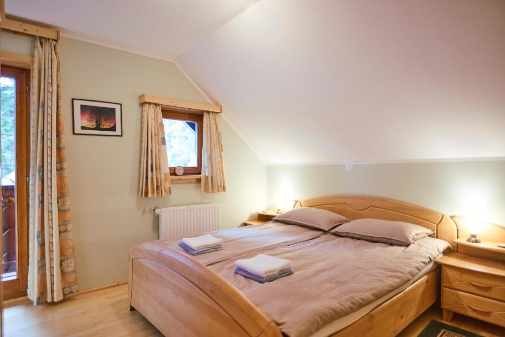 Postel nebo postele na pokoji v ubytování Apartma Smučišče Krvavec