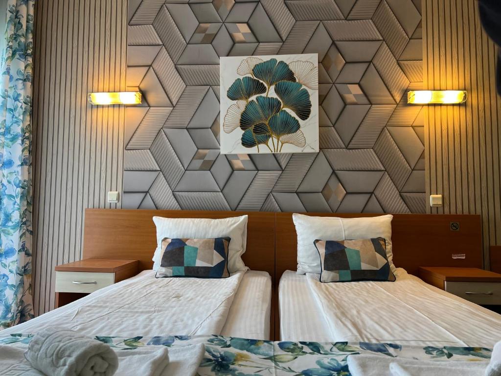Postel nebo postele na pokoji v ubytování Hotel Violeta