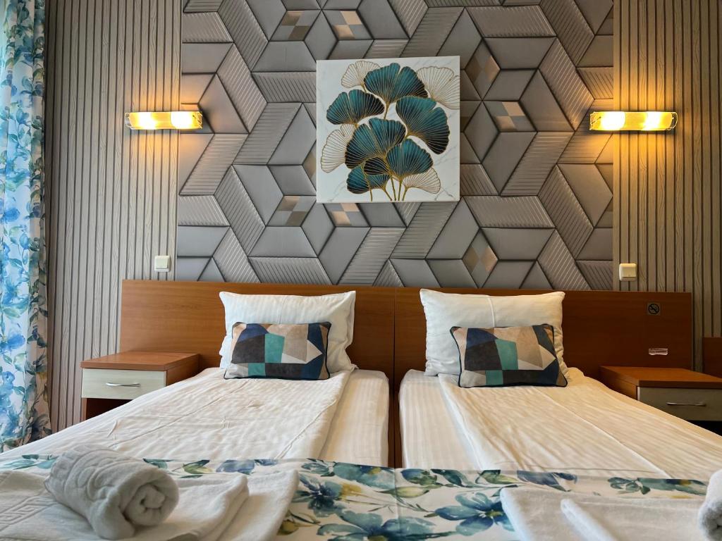 Postel nebo postele na pokoji v ubytování Hotel Violeta