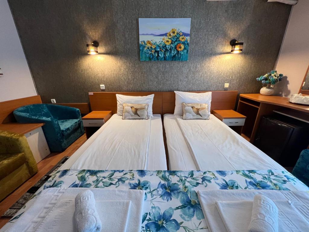 Postel nebo postele na pokoji v ubytování Hotel Violeta