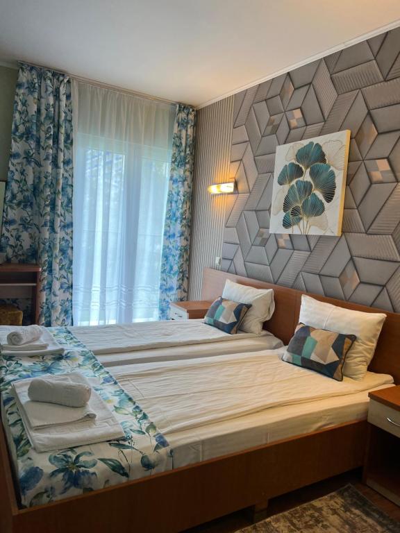Postel nebo postele na pokoji v ubytování Hotel Violeta