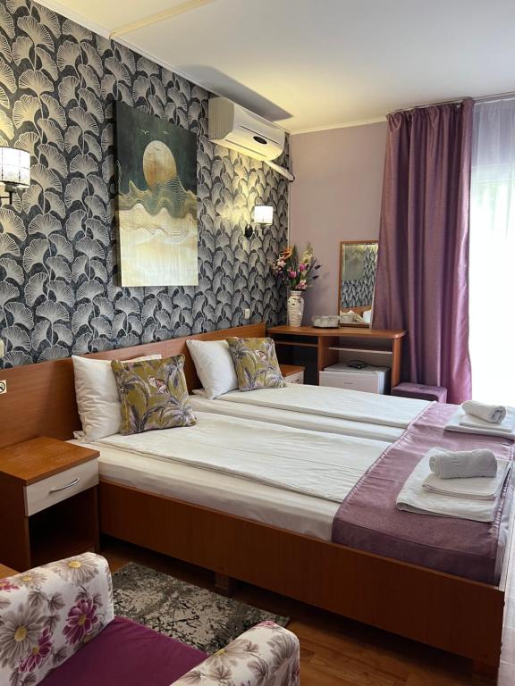 Postel nebo postele na pokoji v ubytování Hotel Violeta