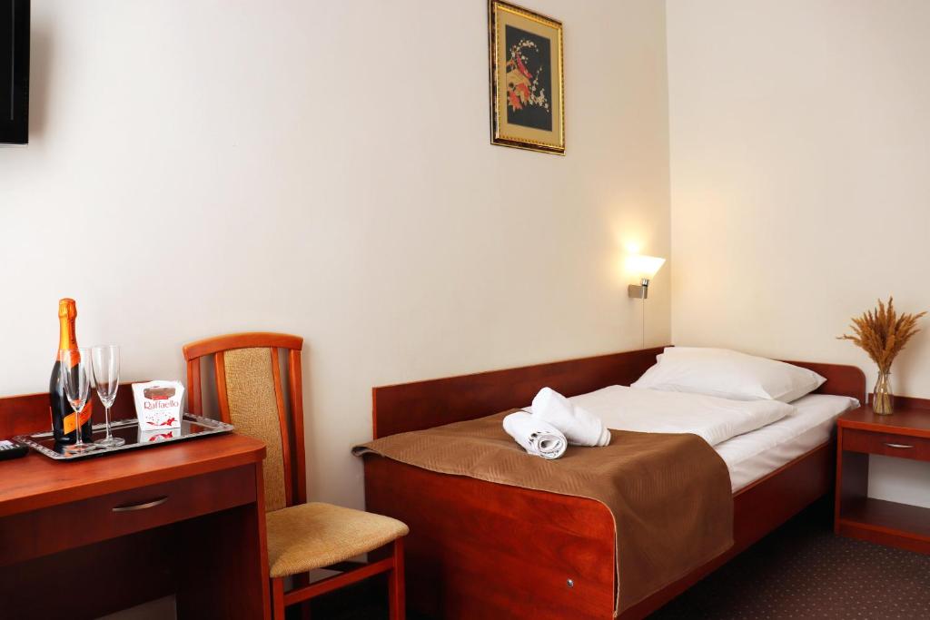 Posteľ alebo postele v izbe v ubytovaní Hotel Lothus