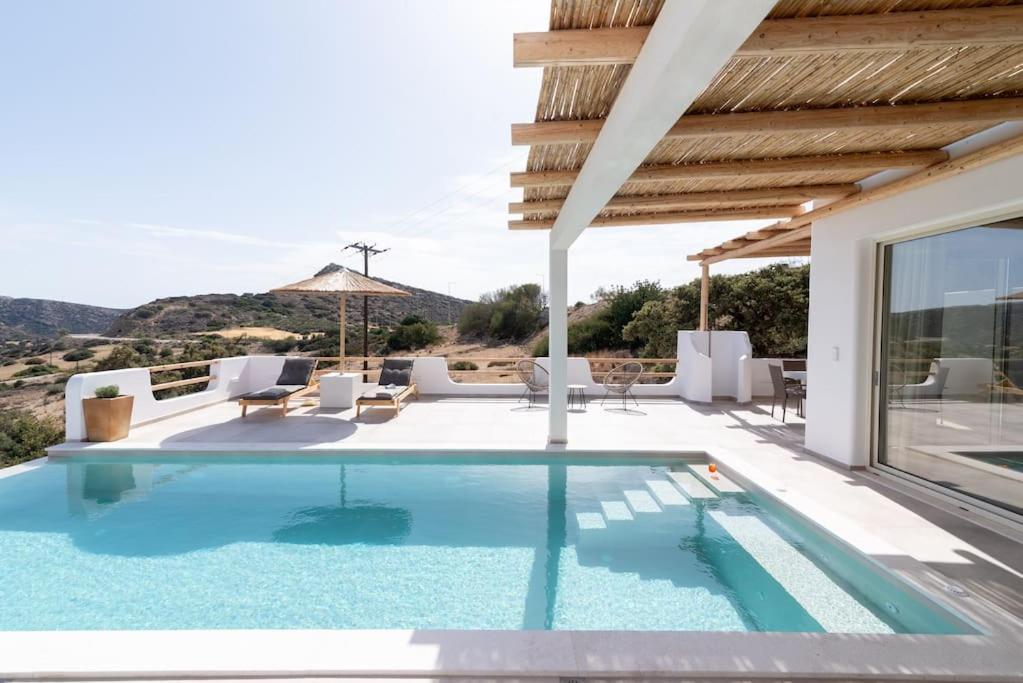 a swimming pool in a villa with a view at Nostos Brand new Private Villa in Pitsidia