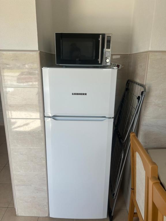 Kuchyňa alebo kuchynka v ubytovaní Apartments Nicole Wera
