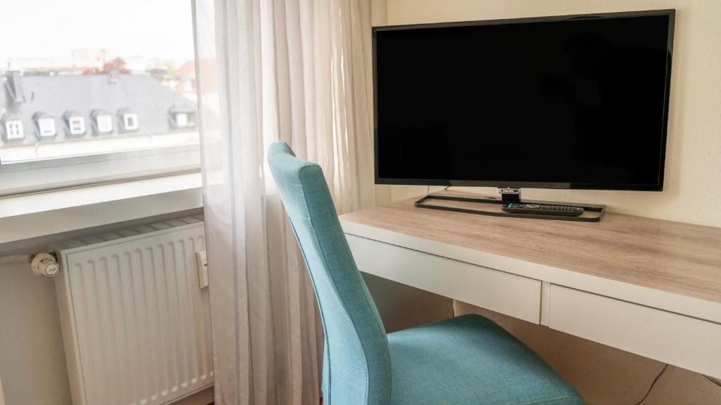 TV a/nebo společenská místnost v ubytování Hotel Kleiner Markt