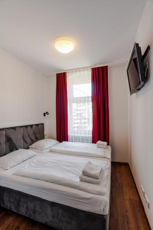 Postel nebo postele na pokoji v ubytování Hotel Prens Berlin