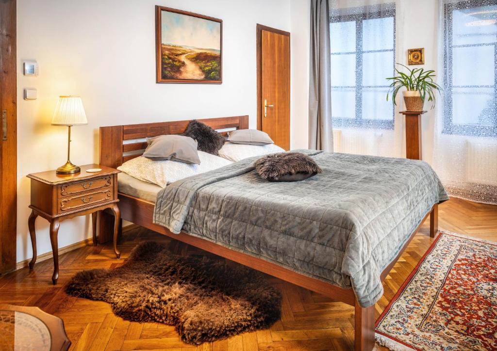 Postel nebo postele na pokoji v ubytování Apartments Dlouhá 93