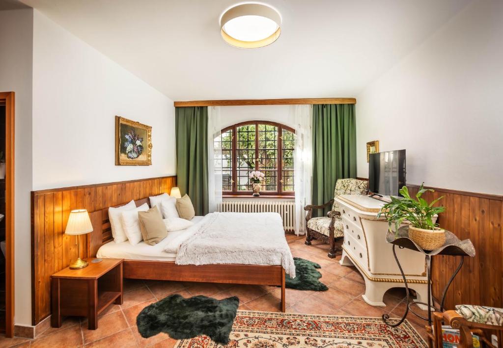Postel nebo postele na pokoji v ubytování Apartments Dlouhá 93