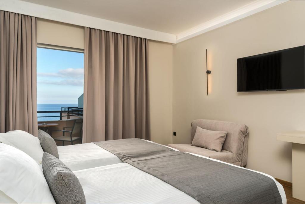 Postel nebo postele na pokoji v ubytování Palatino Hotel