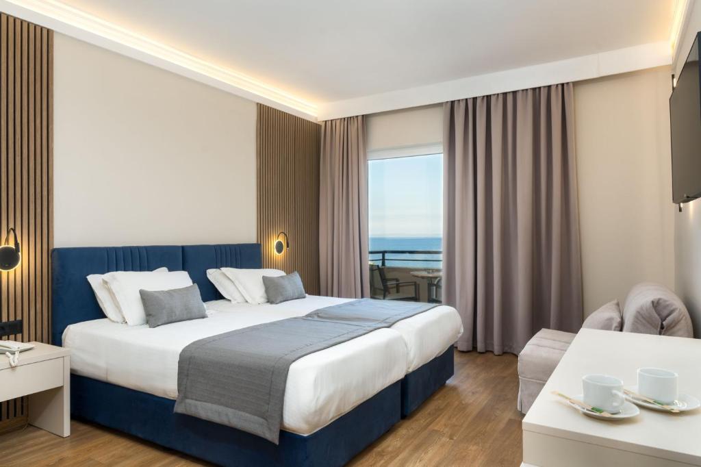 Postel nebo postele na pokoji v ubytování Palatino Hotel